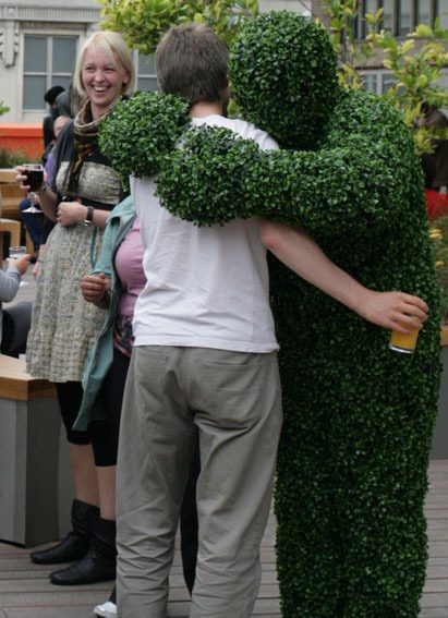 Living Topiary Hugs Man